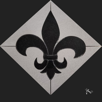 New Orleans style Fleur de Lis made from Absolute Black Granite tile with Grey porcelain tile background.  For installation in kitchen backsplash, floor entry, or shower area.