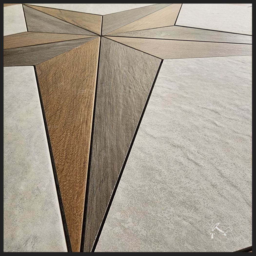 Closeup picture showing the texture of the Wood look tile and porcelain background tile for this Texas Star medallion.