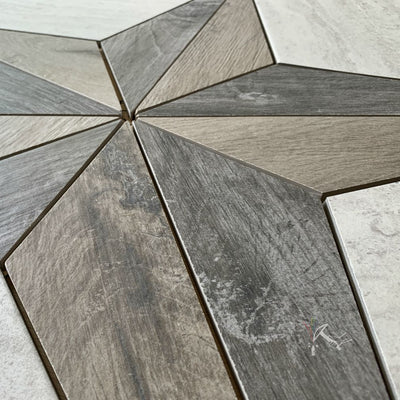 Closeup of Wood Look Texas Star Tile Floor Medallion in gray
