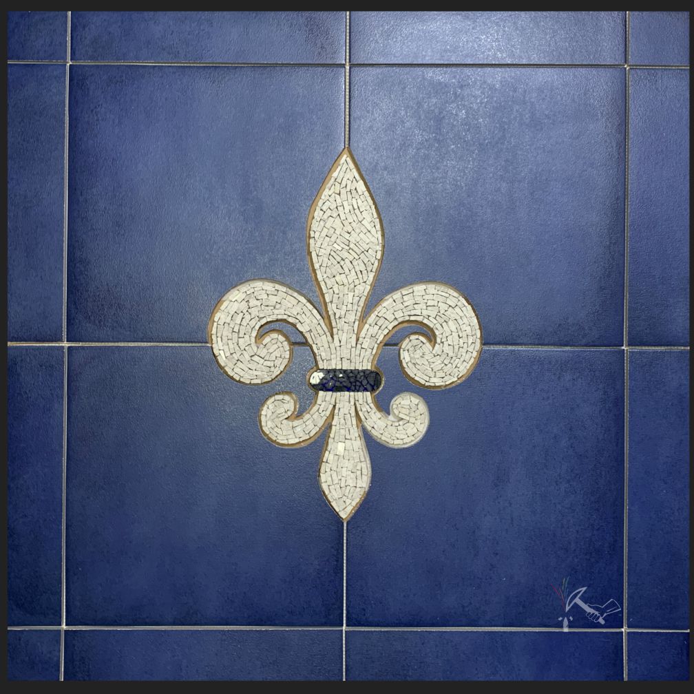 Marble Mosaic Fleur de Lis with Blue Tile Surround
