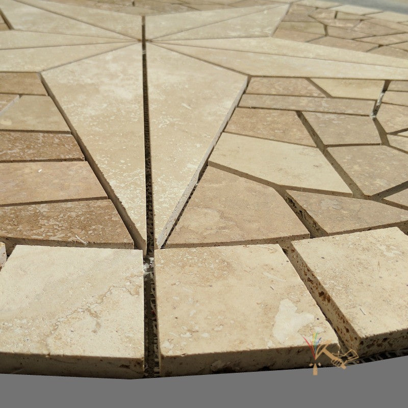 Closeup of round travertine tile Texas star floor medallion.